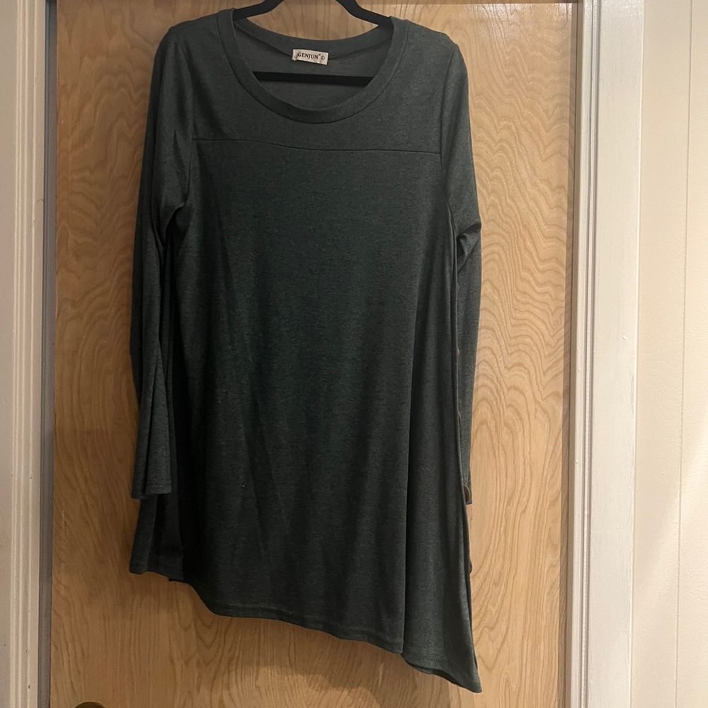 Green asymmetrical tunic with button detail